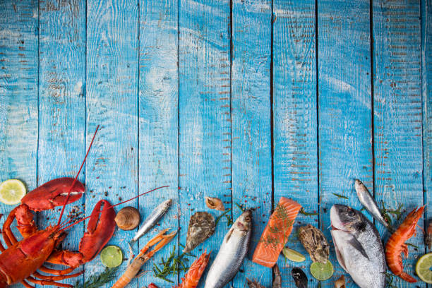 istock Fresh tasty seafood served on old wooden table 938498416