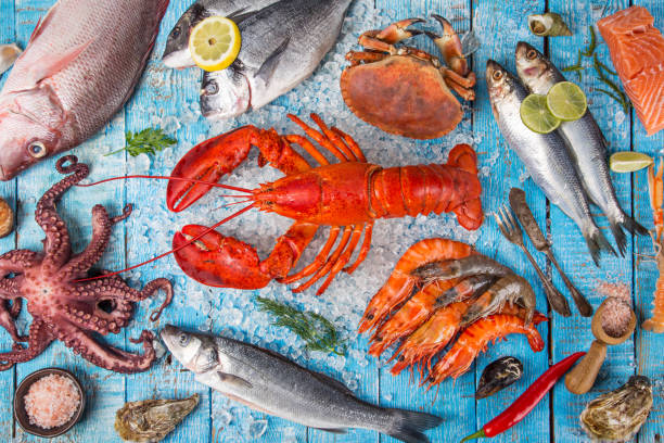 istock Fresh tasty seafood served on old wooden table 938498502
