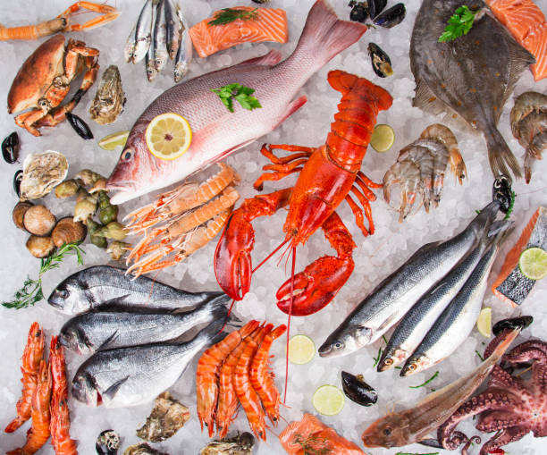 istock Fresh tasty seafood served on old wooden table 938498730