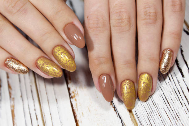 istock Manicured nails Nail Polish art design. 938515976