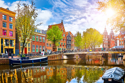 Canal en Amsterdam Países Bajos casas río Amstel photo