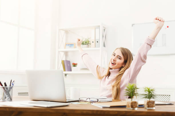 istock Business woman enjoying successful project 938524404