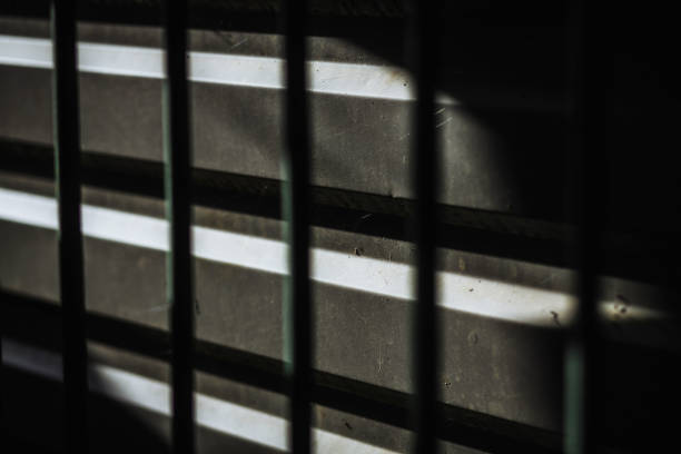istock Dark abstract background with metal bar shadow 938524808