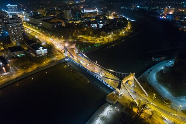 istock Aerial night drone view on Grunwald Bridge over Odre river in Wroclaw 938527806