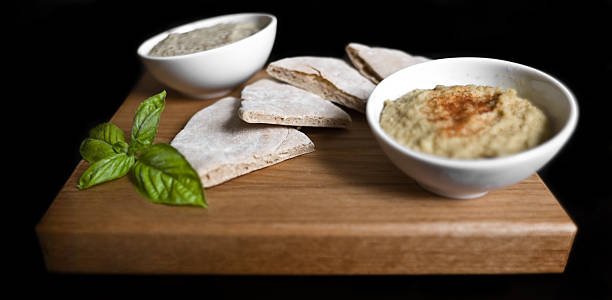 Hummus, Pita, and Baba Ganoush stock photo