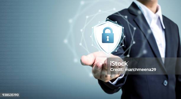 Protection Network Security Computer And Safe Your Data Concept Businessman Holding Shield Protect Icon Stock Photo - Download Image Now