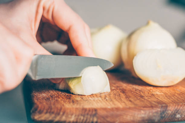 istock Cooking in the kitchen, slicing ingredients 938535730