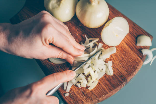 istock Cooking in the kitchen, slicing ingredients 938539508