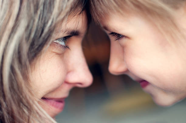 Mother and daughter Mother and daughter looking at each other and smiling. Soft focus, shallow depth of field.
Pentax K7 face to face stock pictures, royalty-free photos & images