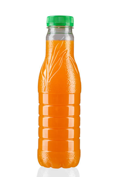 istock bottle with orange juice isolated on white background. 938547674