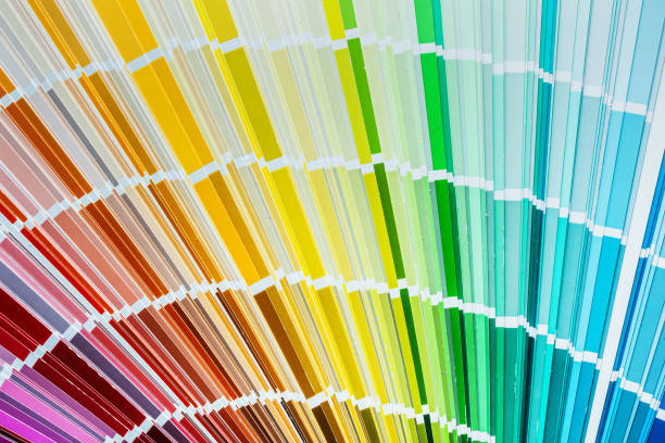 istock Color swatch fan on wooden board top view 938550046