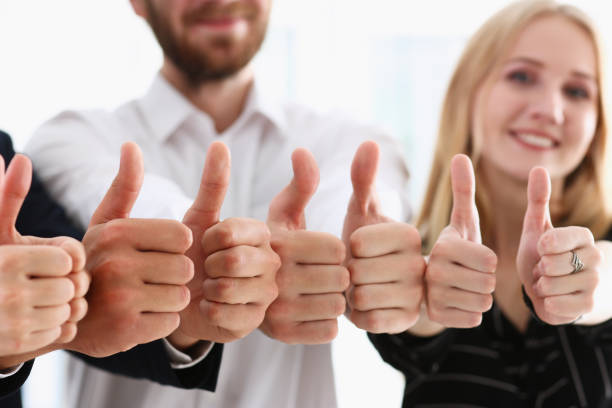 istock Group of people show ok or confirm with 938556220
