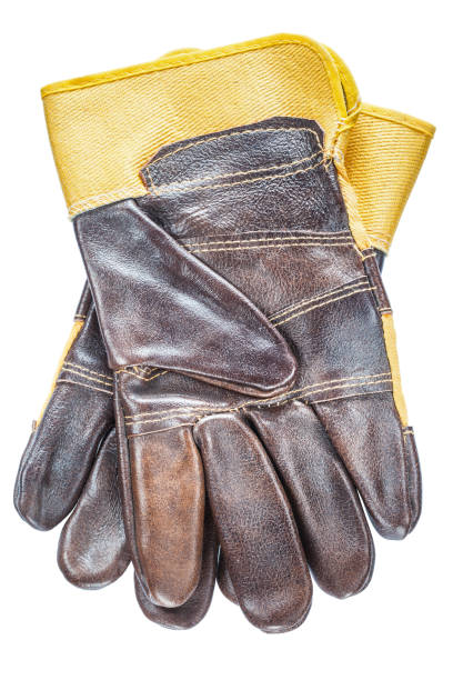istock Brown safety gloves isolated on white 938559712