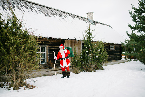 Authentic nordic Santa in his home preparing for Christmas