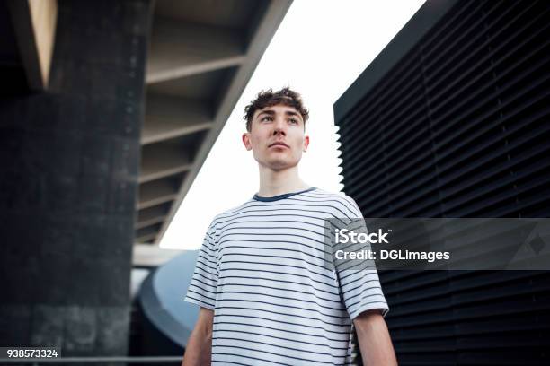 Freerunner On The Rooftops Stock Photo - Download Image Now - Teenager, Adolescence, City