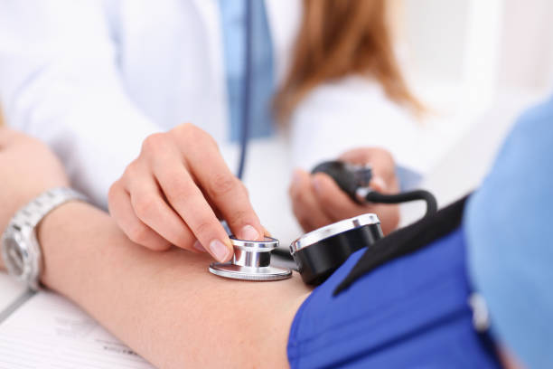 istock Female doctor arms make medic procedure closeup 938574490