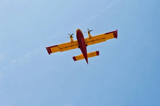 Photo of Fire fighter airplane in the sky over the Mediterranean Sea near Omis in Croatia