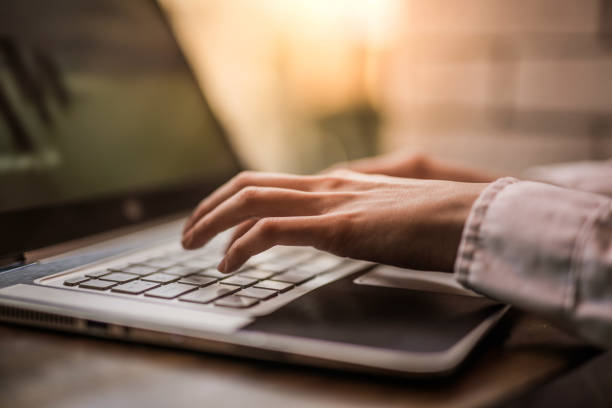 istock Young female freelancer typing on laptop keyboard. 938582752
