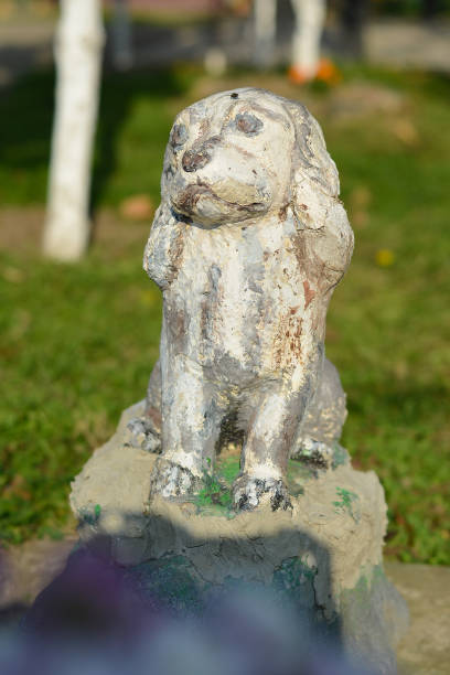 istock Garden statue of a dog 938587484