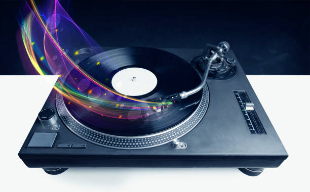 istock Turntable playing vinyl with glowing abstract lines 938588074