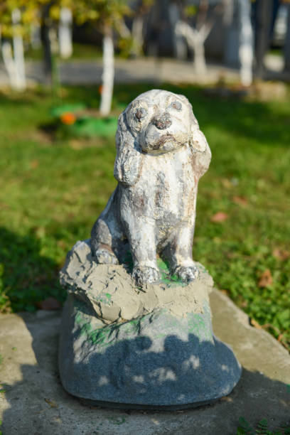 istock Garden statue of a dog 938588428