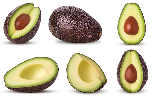 Set brown mature avocado whole, three quarters with bone, cut in half, slice isolated on white background. Clipping Path. Full depth of field.