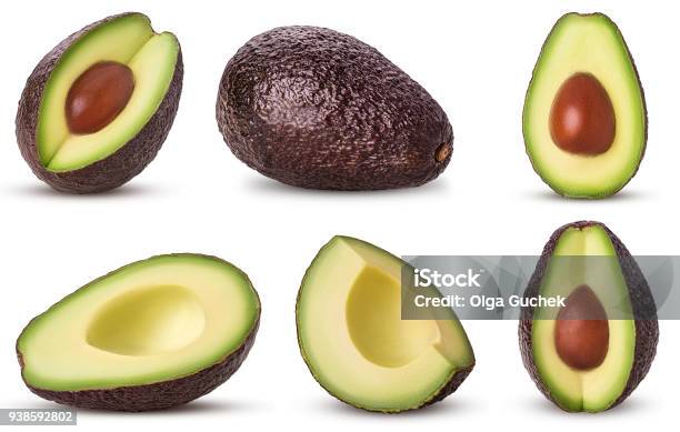 Set Brown Mature Avocado Whole Three Quarters With Bone Cut In Half Slice Stock Photo - Download Image Now