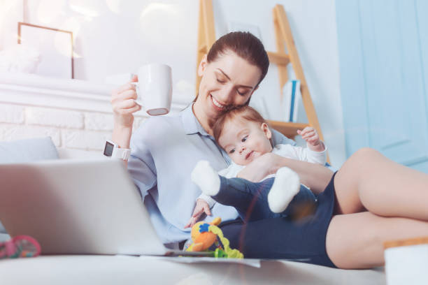 istock Cheerful pretty woman spending time with her daughter 938598678