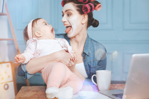 istock Happy delighted woman having fun with her daughter 938599352