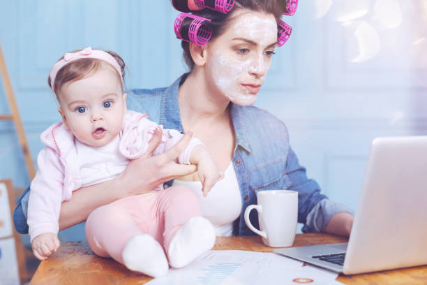 istock Pleasant good looking woman using a laptop 938599388