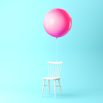 Beautiful balloon pink with chair concept on pastel blue background. minimal idea concept. An idea creative to produce work within an advertising marketing communications or artwork design.