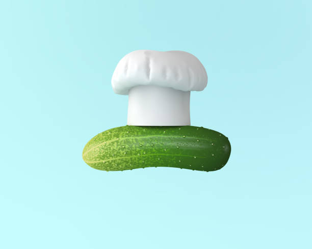 istock Chef hat with cucumber concept on pastel blue background. minimal idea food and fruit concept. An idea creative to produce work within an advertising marketing communications or artwork design. 938611506