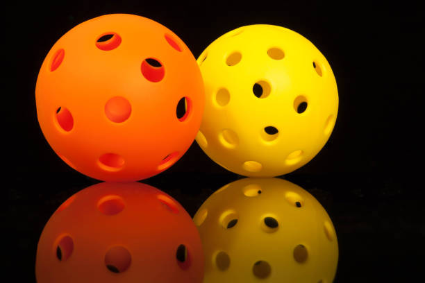 istock Orange & Yellow Pickleball 938622398
