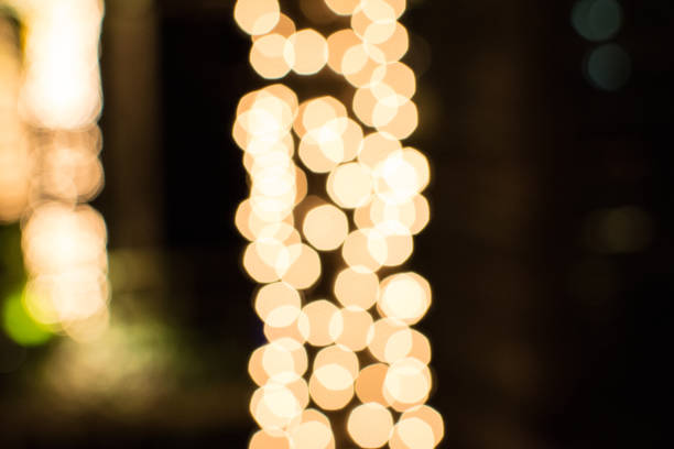 istock Colorful beautiful blurred bokeh background. Glitter multi colored light spots on light backdrop, defocused 938624142