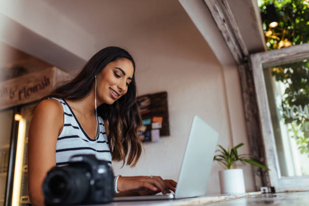 istock Woman working on laptop computer at home 938627986