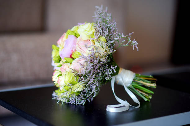 istock Beautiful wedding bouquet on a table 938635898