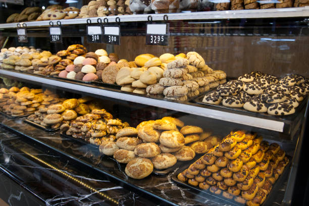 istock Various fresh pastries on display at a bakery shop 938637604