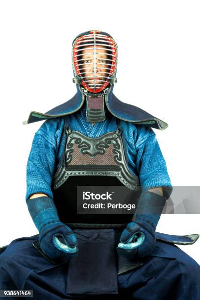 Male Wearing A Kendo Armor With Helmet And Gloves Sitting Position Stock Photo - Download Image Now