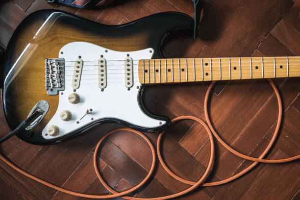 istock Electric Guitar on wooden floor 938644290