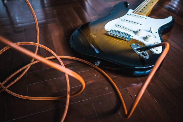 istock Electric Guitar on wooden floor 938644300