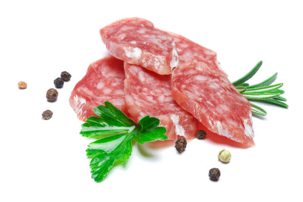 istock Dried sliced organic salami sausage on white background 938648572