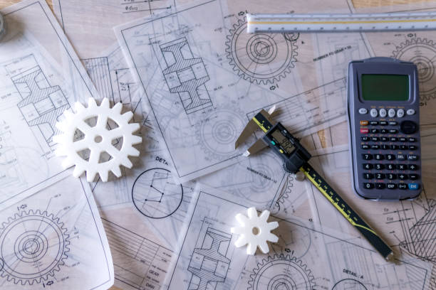 istock Workplace desk of Engineering mechanical for designing mechanical scheme parts. several drawing and Measuring tools Concept. 938661214