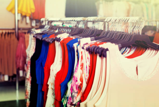 istock Looking for new dress in showroom 938666836