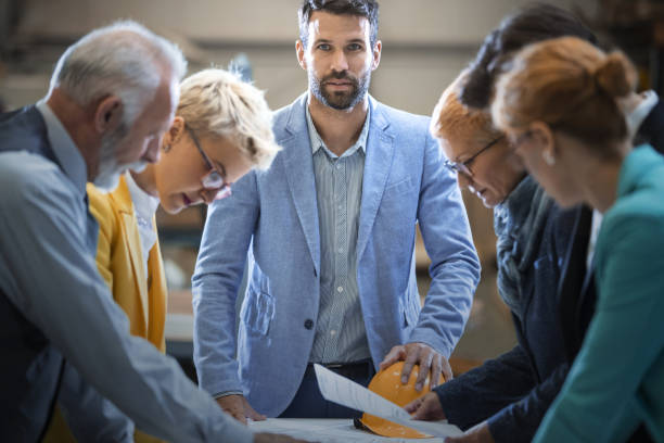 istock Industrial design team in a meeting. 938666910