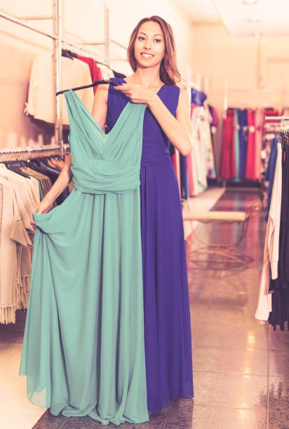 istock Woman choosing new dress 938666932