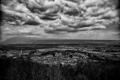 Town under the clouds, hdr black and white horizontal image