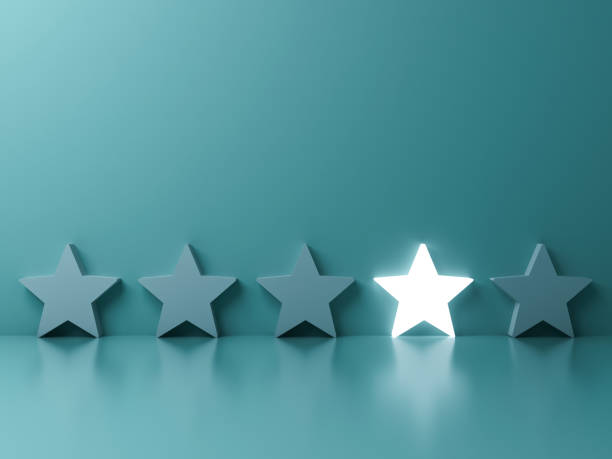 istock Stand out from the crowd and different creative idea concepts , One glowing star standing among other dim stars on green pastel color background with reflections and shadows 938669886