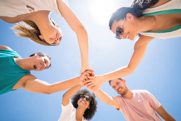 istock Happy Brazilian friends outdoors with hands together 938670224