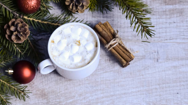 istock Coffee with marshmallows at the Christmas tree. Festive warming 938673140