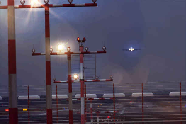 istock working airport beacons with starting airplane in the evening 938673496